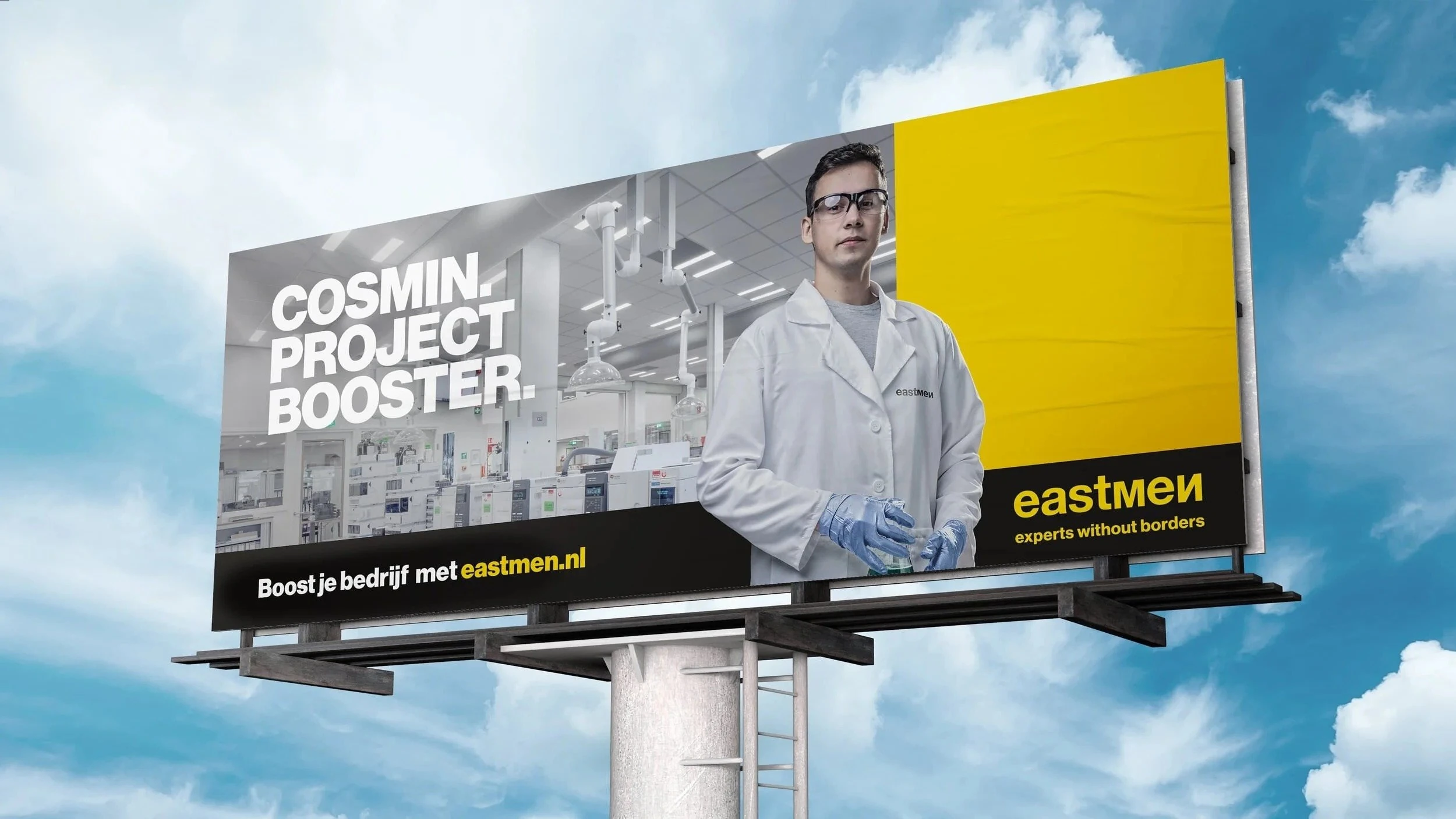Billboard Eastmen: "Cosmin. Project booster.", technicus in labjas. Boost je bedrijf met eastmen.nl