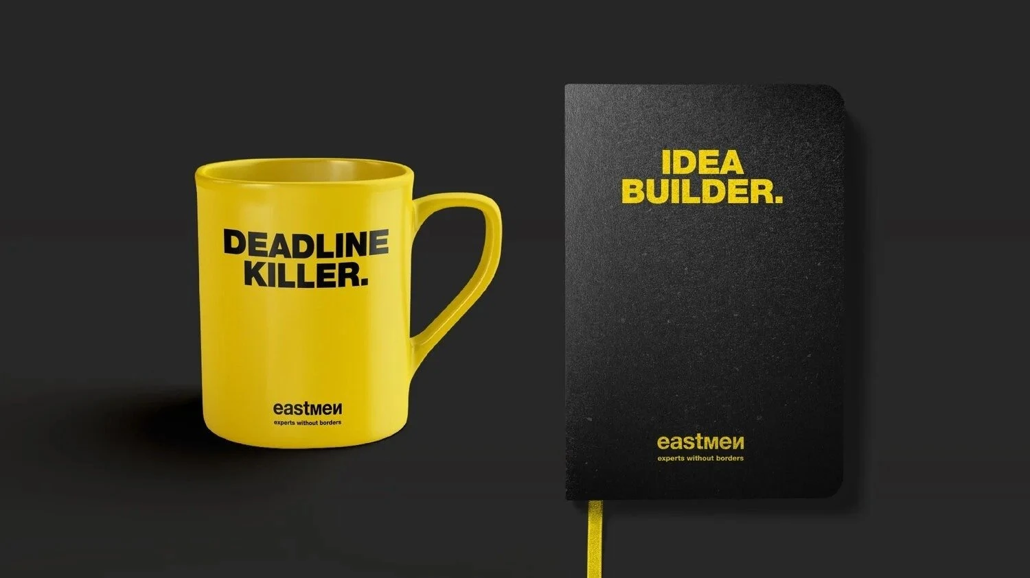 Eastmen-merchandise: gele mok "Deadline killer" en zwart notitieboek "Idea builder"